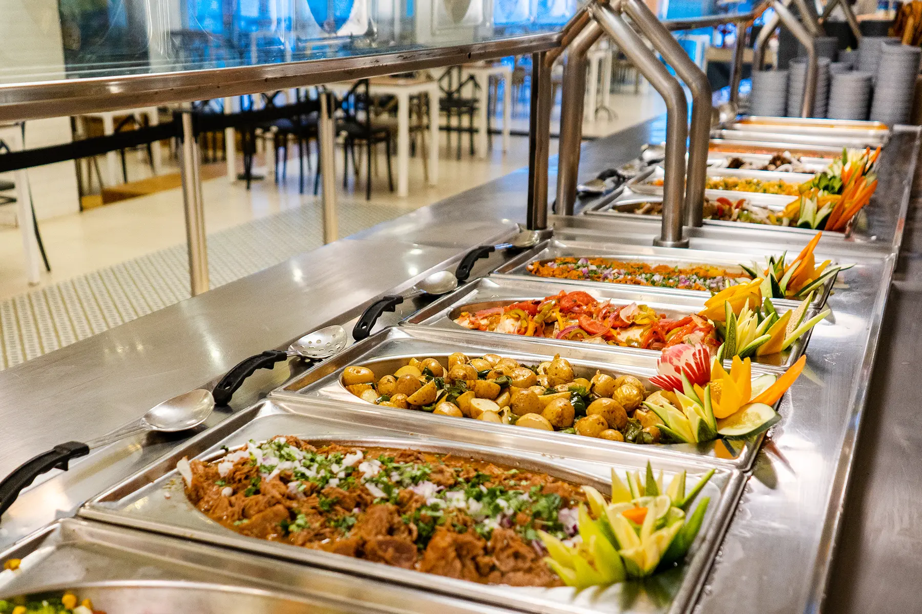 Barbecue food, chambray chips, Veracruz-style fish at the buffet bar of the Oceano Palace Mazatlán hotel terrace restaurant